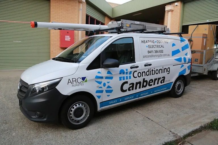 One of the Air Conditioning Canberra & Electrical vans, carrying the logo we made in 2016.